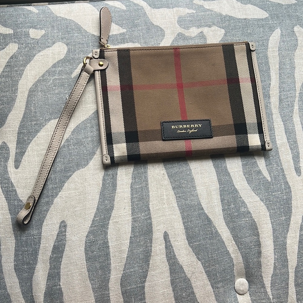 Burberry pouch, with iconic Burberry print.